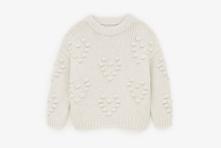 Jersey de punto en color beige con corazones de Zara